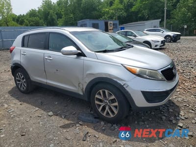 Czwarte zdjęcie samochodu z boku: 2014 KIA SPORTAGE LX VIN:KNDPBCAC1E7573541 - miniatura