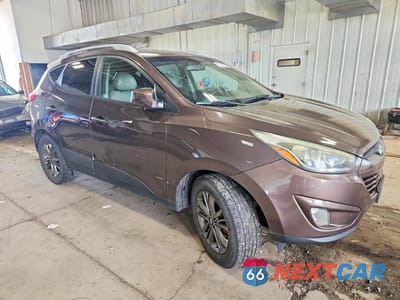 Czwarte zdjęcie samochodu z boku: 2014 HYUNDAI TUCSON SE VIN:KM8JUCAG5EU823279 - miniatura