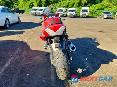 Czwarte zdjęcie samochodu z boku: 2006 KAWASAKI ZX1400 A VIN:JKBZXNA106A007448 - miniatura