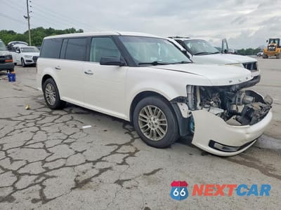 Czwarte zdjęcie samochodu z boku: 2016 FORD FLEX SEL VIN:2FMGK5C89GBA19917 - miniatura