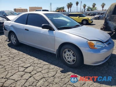 Czwarte zdjęcie samochodu z boku: 2001 HONDA CIVIC LX VIN:1HGEM22551L007252 - miniatura