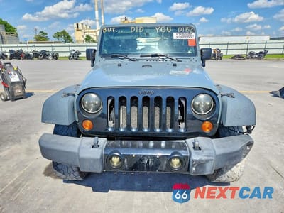 Piąte zdjęcie samochodu w środku: 2014 JEEP WRANGLER UNLIMITED SPORT VIN:1C4BJWDGXEL255616 - miniatura