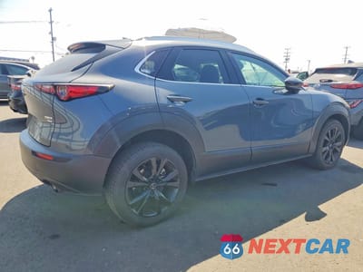Trzecie zdjęcie samochodu z tyłu: 2022 MAZDA CX-30 PREMIUM VIN:3MVDMBDY8NM448085 - miniatura