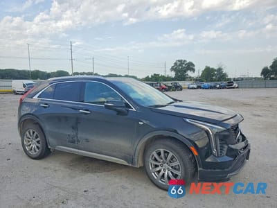 Czwarte zdjęcie samochodu z boku: 2023 CADILLAC XT4 PREMIUM LUXURY VIN:1GYFZDR40PF100551 - miniatura