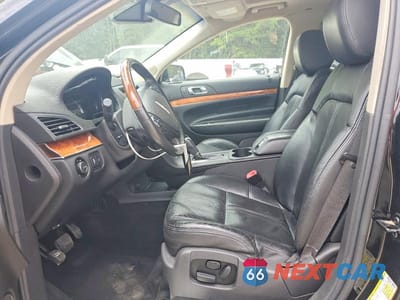 Zdjęcie 7 z 13 samochodu: 2014 LINCOLN MKT VIN:2LMHJ5AT4EBL56768 - miniatura