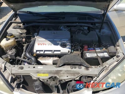 Zdjęcie 11 z 12 samochodu: 2004 TOYOTA CAMRY LE V6 VIN:4T1BF30K74U586894 - miniatura
