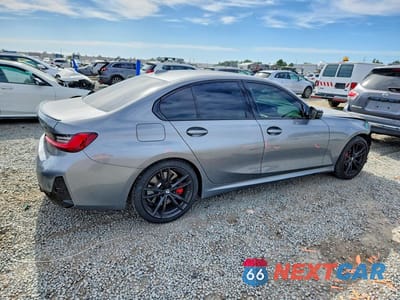 Trzecie zdjęcie samochodu z tyłu: 2023 BMW 330XI VIN:3MW89FF05P8D69095 - miniatura