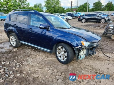 Czwarte zdjęcie samochodu z boku: 2012 MITSUBISHI OUTLANDER SE VIN:JA4JT3AW6CU000723 - miniatura
