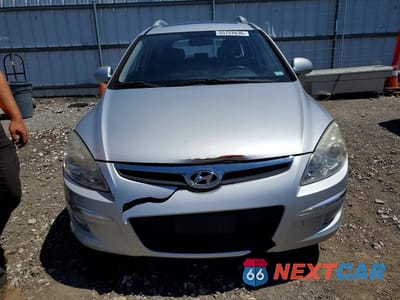 Piąte zdjęcie samochodu w środku: 2012 HYUNDAI ELANTRA TOURING SE VIN:KMHDC8AE6CU136904 - miniatura