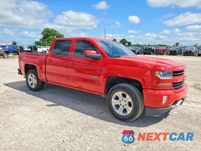 Czwarte zdjęcie samochodu z boku: 2018 CHEVROLET SILVERADO K1500 LT VIN:3GCUKREC8JG172793 - miniatura