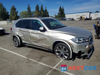 Czwarte zdjęcie samochodu z boku: 2015 BMW X5 VIN:5UXKR0C55F0K65073 - miniatura