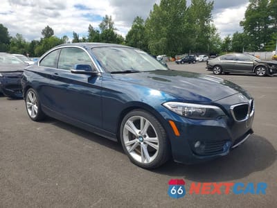 Czwarte zdjęcie samochodu z boku: 2014 BMW 228 I VIN:WBA1F5C5XEV246049 - miniatura
