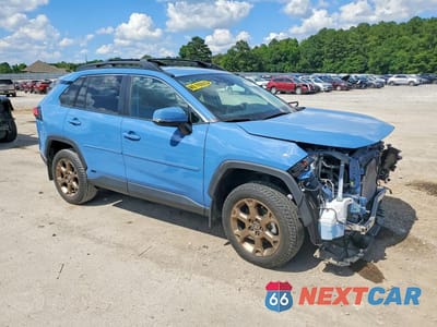 Czwarte zdjęcie samochodu z boku: 2023 TOYOTA RAV4 WOODLAND EDITION VIN:2T3UWRFV5PW185904 - miniatura