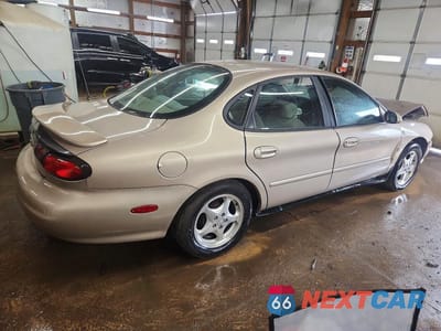 Trzecie zdjęcie samochodu z tyłu: 1999 FORD TAURUS SE VIN:1FAFP53S3XG214293 - miniatura