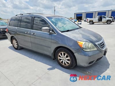 Czwarte zdjęcie samochodu z boku: 2010 HONDA ODYSSEY EX VIN:5FNRL3H53AB011531 - miniatura