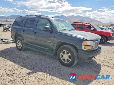 Czwarte zdjęcie samochodu z boku: 2004 GMC YUKON DENALI VIN:1GKEK63U74J282501 - miniatura