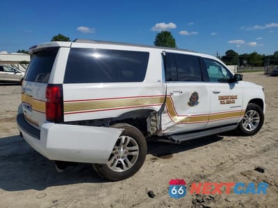 Trzecie zdjęcie samochodu z tyłu: 2016 CHEVROLET SUBURBAN K1500 VIN:1GNSKKEC4GR386713 - miniatura
