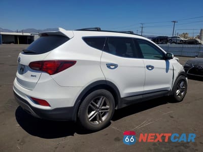 Trzecie zdjęcie samochodu z tyłu: 2018 HYUNDAI SANTA FE SPORT 2.4L VIN:5NMZU3LB3JH052816 - miniatura