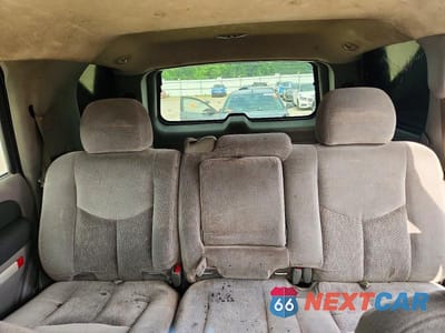 Zdjęcie 10 z 13 samochodu: 2003 CHEVROLET TAHOE C1500 VIN:1GNEC13V83R105712 - miniatura