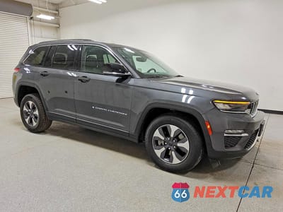 Czwarte zdjęcie samochodu z boku: 2022 JEEP GRAND CHEROKEE LIMITED 4XE VIN:1C4RJYB60N8717012 - miniatura