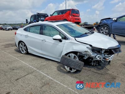 Czwarte zdjęcie samochodu z boku: 2016 CHEVROLET CRUZE PREMIER VIN:1G1BG5SMXG7240202 - miniatura