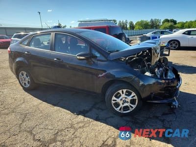Czwarte zdjęcie samochodu z boku: 2015 FORD FIESTA SE VIN:3FADP4BJXFM218792 - miniatura