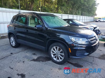 Czwarte zdjęcie samochodu z boku: 2015 VOLKSWAGEN TIGUAN S VIN:WVGAV7AXXFW614663 - miniatura
