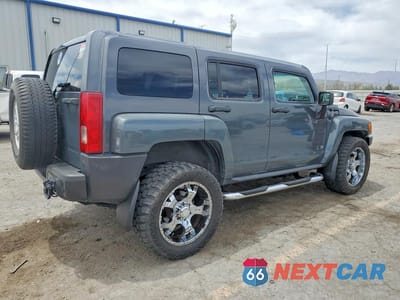 Trzecie zdjęcie samochodu z tyłu: 2009 HUMMER H3 VIN:5GTEN13E498135333 - miniatura