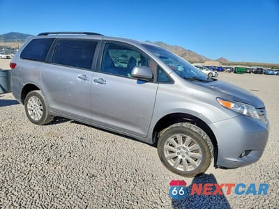 Czwarte zdjęcie samochodu z boku: 2015 TOYOTA SIENNA XLE 7-PASSENGER VIN:5TDDK3DC9FS117180 - miniatura