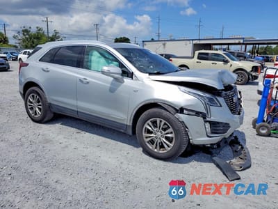 Czwarte zdjęcie samochodu z boku: 2020 CADILLAC XT5 PREMIUM LUXURY VIN:1GYKNCRS8LZ112295 - miniatura