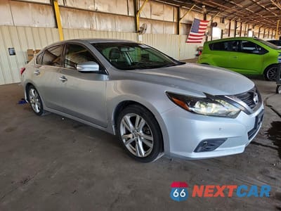 Czwarte zdjęcie samochodu z boku: 2017 NISSAN ALTIMA 3.5 SL VIN:1N4BL3AP9HC195691 - miniatura