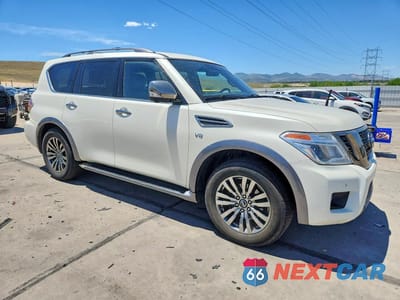 Czwarte zdjęcie samochodu z boku: 2018 NISSAN ARMADA VIN:JN8AY2NE6J9734561 - miniatura