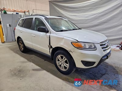 Czwarte zdjęcie samochodu z boku: 2012 HYUNDAI SANTA FE VIN:5XYZGDAB0CG119479 - miniatura
