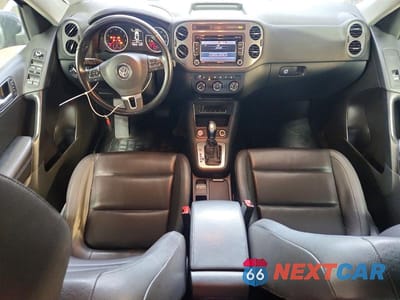 Zdjęcie 8 z 13 samochodu: 2014 VOLKSWAGEN TIGUAN S VIN:WVGAV3AX4EW616514 - miniatura