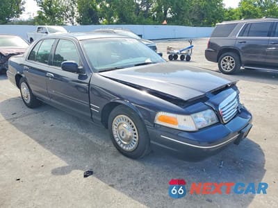 Czwarte zdjęcie samochodu z boku: 1999 FORD CROWN VICTORIA VIN:2FAFP73W0XX121210 - miniatura