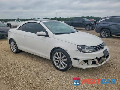 Czwarte zdjęcie samochodu z boku: 2013 VOLKSWAGEN EOS KOMFORT VIN:WVWBW8AH7DV001844 - miniatura