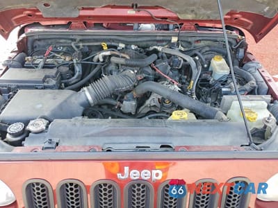 Zdjęcie 12 z 13 samochodu: 2009 JEEP WRANGLER UNLIMITED SAHARA VIN:1J4GA59179L767158 - miniatura