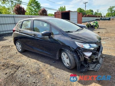 Czwarte zdjęcie samochodu z boku: 2019 HONDA FIT LX VIN:3HGGK5H48KM737199 - miniatura
