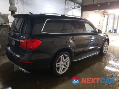 Trzecie zdjęcie samochodu z tyłu: 2014 MERCEDES-BENZ GL 550 4MATIC VIN:4JGDF7DE0EA382509 - miniatura