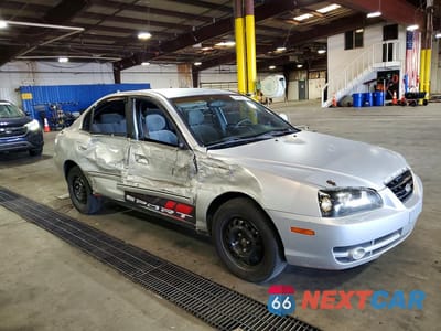 Czwarte zdjęcie samochodu z boku: 2005 HYUNDAI ELANTRA GLS VIN:KMHDN46D05U006123 - miniatura