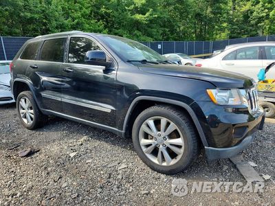 Czwarte zdjęcie samochodu z boku: 2012 JEEP GRAND CHEROKEE LAREDO VIN:1C4RJFAG6CC343286 - miniatura
