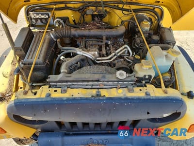 Zdjęcie 11 z 12 samochodu: 2002 JEEP WRANGLER / TJ SPORT VIN:1J4FA49S72P713002 - miniatura