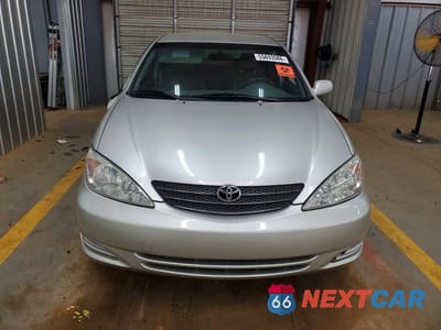 Piąte zdjęcie samochodu w środku: 2003 TOYOTA CAMRY LE VIN:JTDBE32K330227956 - miniatura