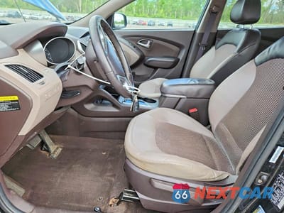 Zdjęcie 7 z 13 samochodu: 2011 HYUNDAI TUCSON GLS VIN:KM8JU3AC4BU285781 - miniatura