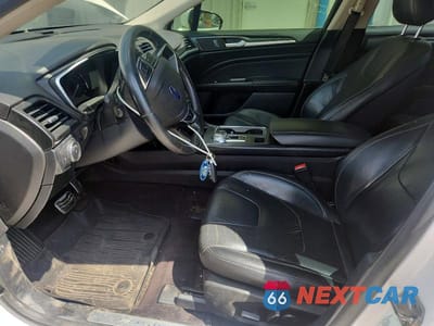 Zdjęcie 7 z 12 samochodu: 2017 FORD FUSION TITANIUM VIN:3FA6P0D96HR209145 - miniatura