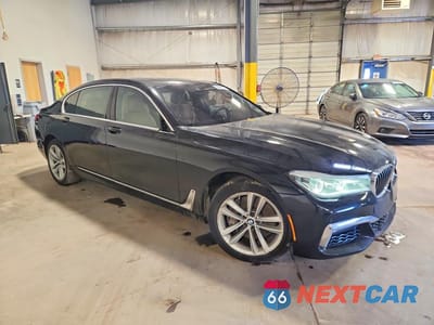 Czwarte zdjęcie samochodu z boku: 2016 BMW 750 XI VIN:WBA7F2C51GG418551 - miniatura