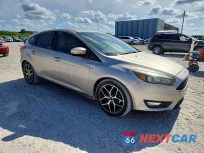Czwarte zdjęcie samochodu z boku: 2017 FORD FOCUS SEL VIN:1FADP3M20HL262367 - miniatura