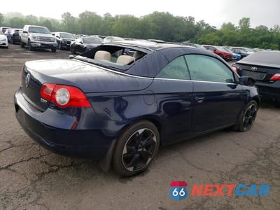 Trzecie zdjęcie samochodu z tyłu: 2011 VOLKSWAGEN EOS KOMFORT VIN:WVWBA7AH1BV001201 - miniatura