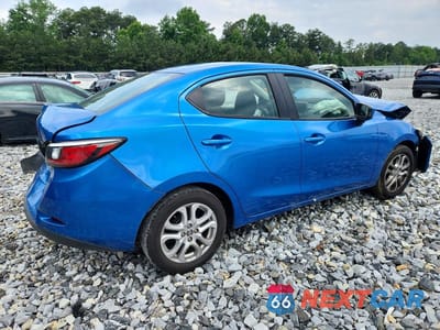 Trzecie zdjęcie samochodu z tyłu: 2016 SCION IA BASE VIN:3MYDLBZV7GY137151 - miniatura