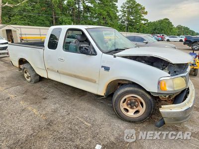 Czwarte zdjęcie samochodu z boku: 2003 FORD F150 VIN:2FTRX17WX3CB14409 - miniatura
